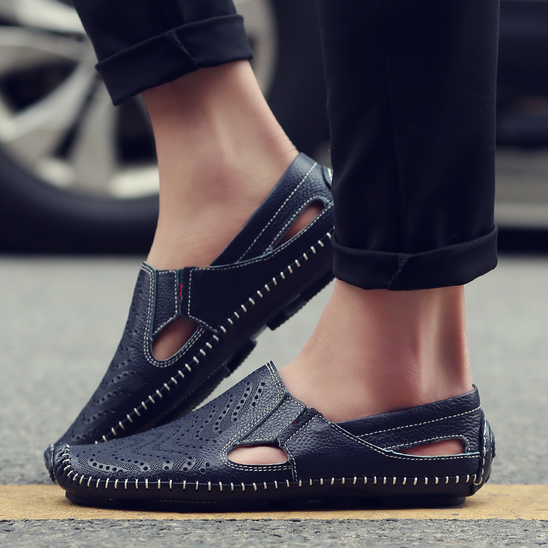 Breathable perforated men's slides, a classic summer sandal and comfortable slip-on.