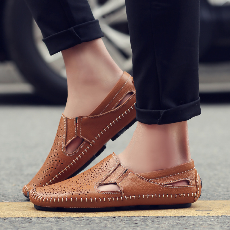 Modern classic men's slides, perforated for breathability, stylish woven detail.
