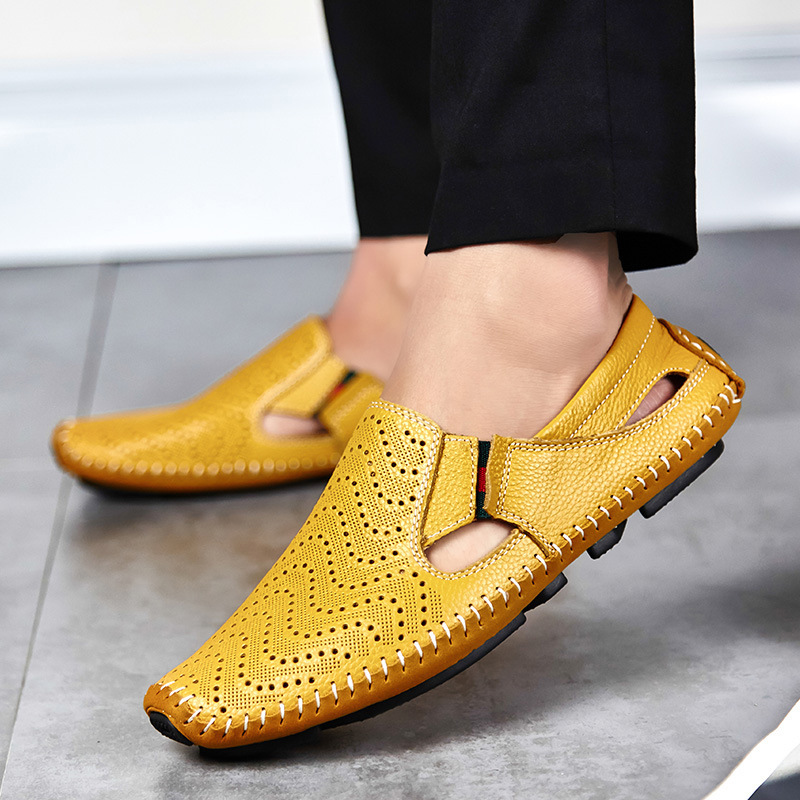 Lightweight men's perforated slides with woven detail, ideal for travel & pool sides.
