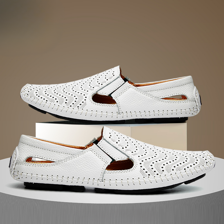 Men's fashion slides: classic, perforated, and unique woven stitch detail for summer style.