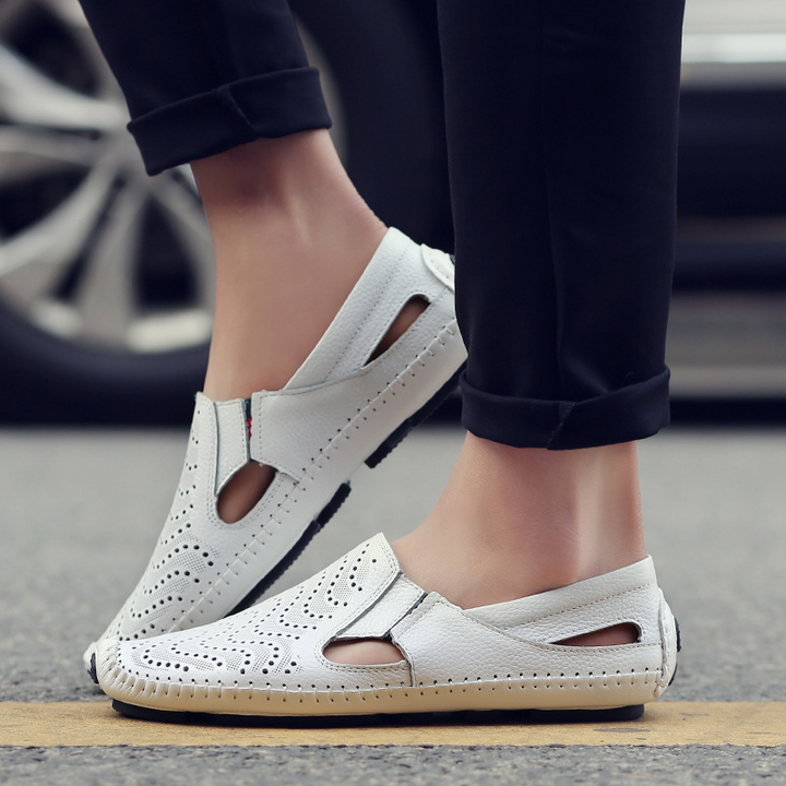 Comfort-first men's perforated slip-ons with stylish woven design, perfect for summer.