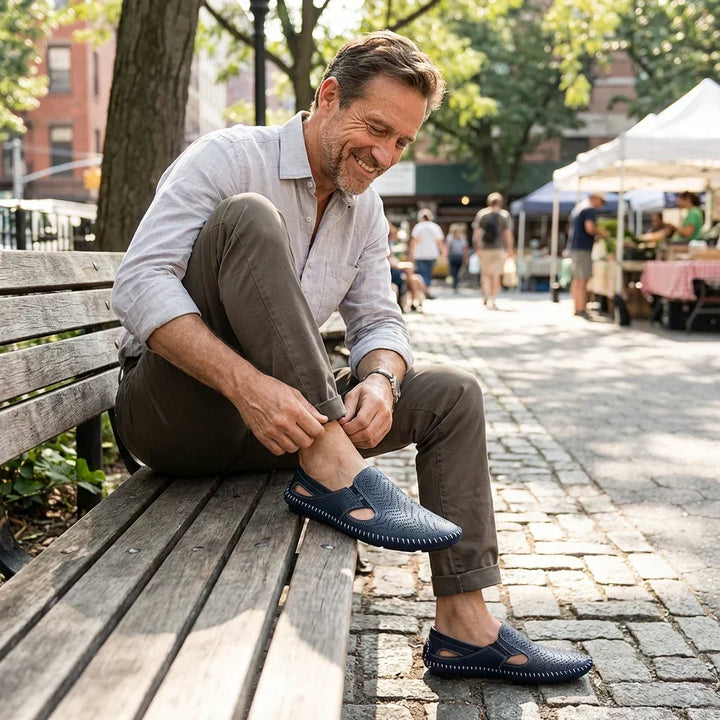 Timeless men's slides, perforated for breathability, elegant woven detail, summer ready.