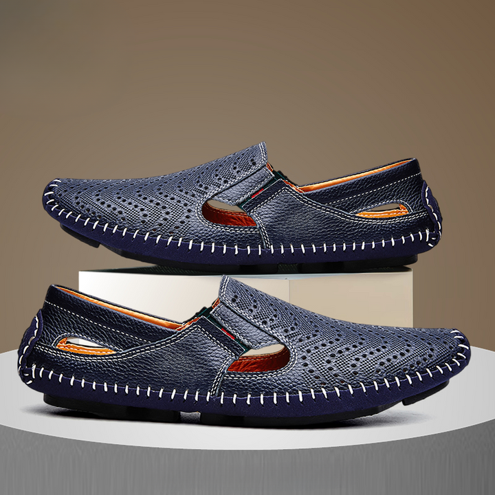 Men's fashion slides: classic style with perforated design and subtle woven elements.