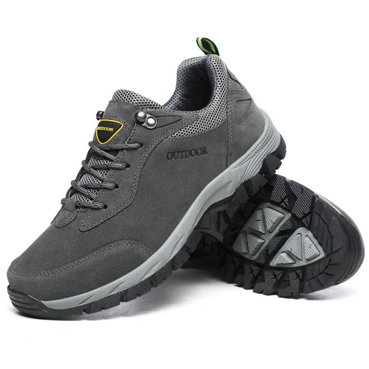 Man actively walking outdoors in durable Men's Jasper orthopedic shoes for hiking & daily wear.