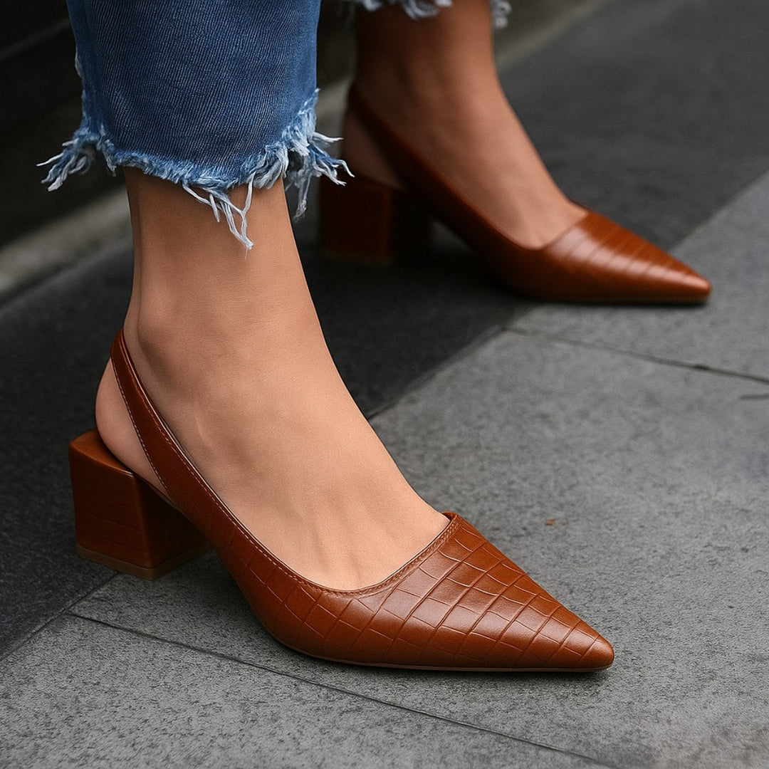 Chic brown women's orthopedic heels for comfortable all-day wear, perfect for elegant evening or event style.