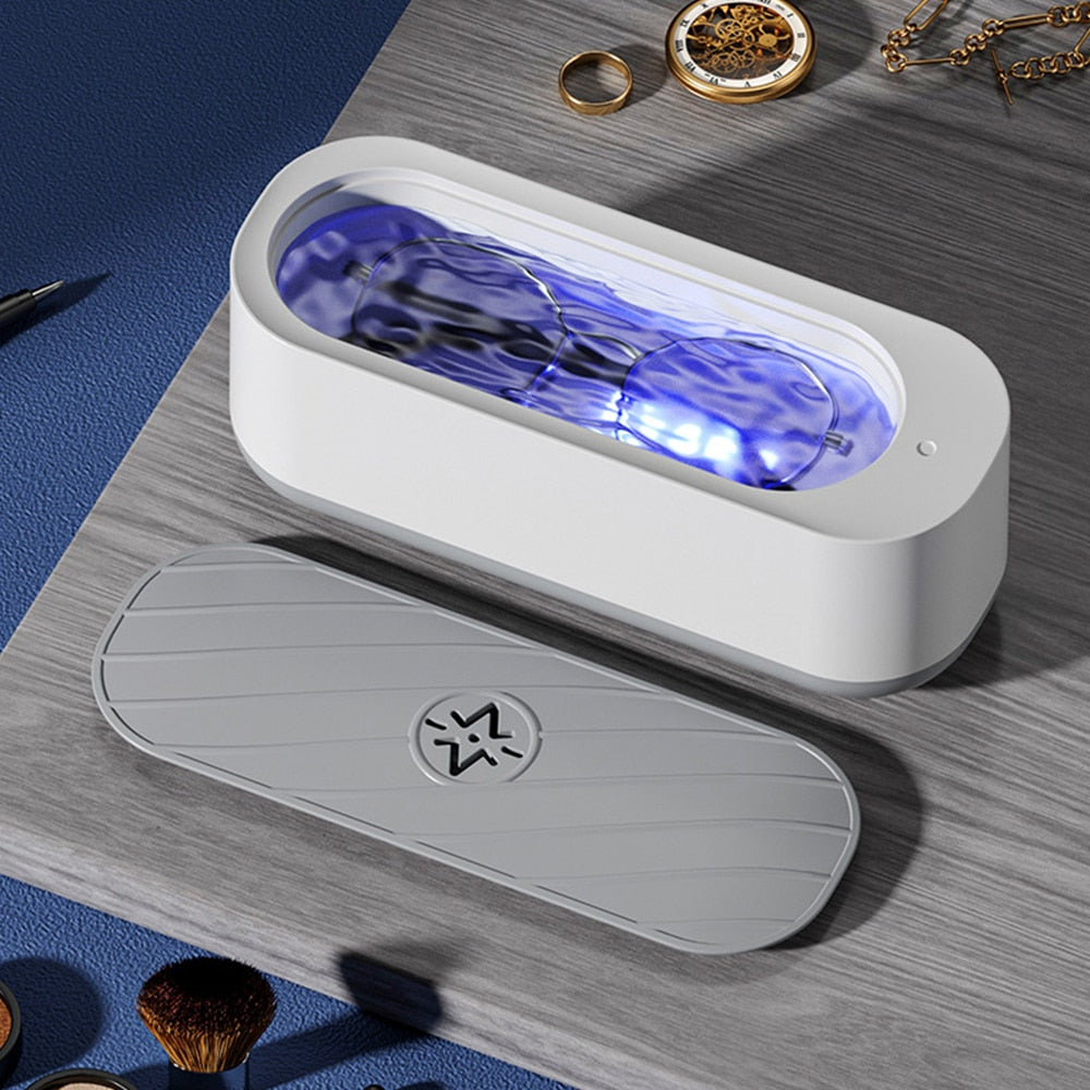 Tech cleaner: ultrasonic machine for jewelry, eyeglasses, watches & valuables. Personal care for gentle sparkle.