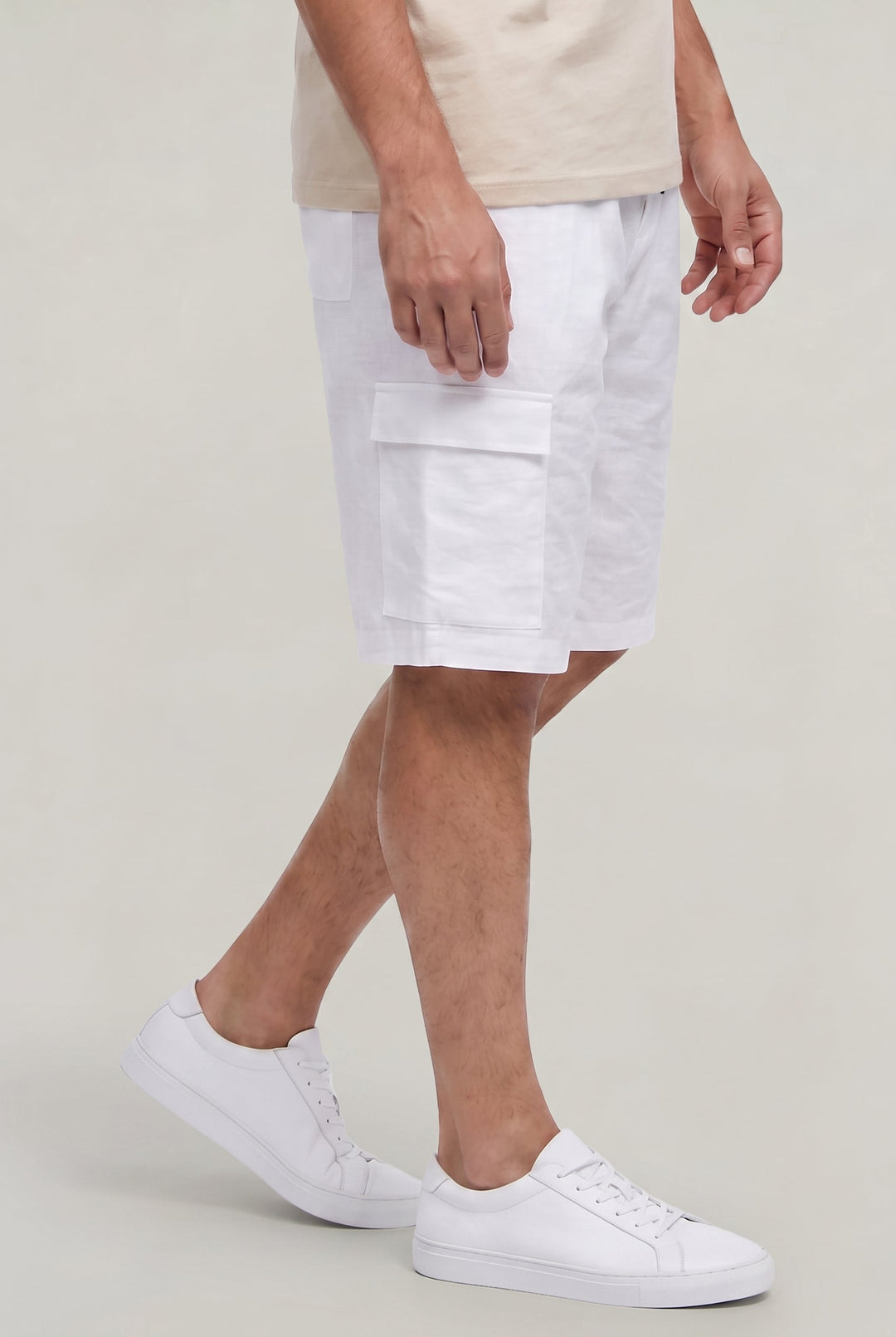 Polished men's cargo shorts. Drawstring waist & multiple pockets. Ideal for warm weather, casual summer style.