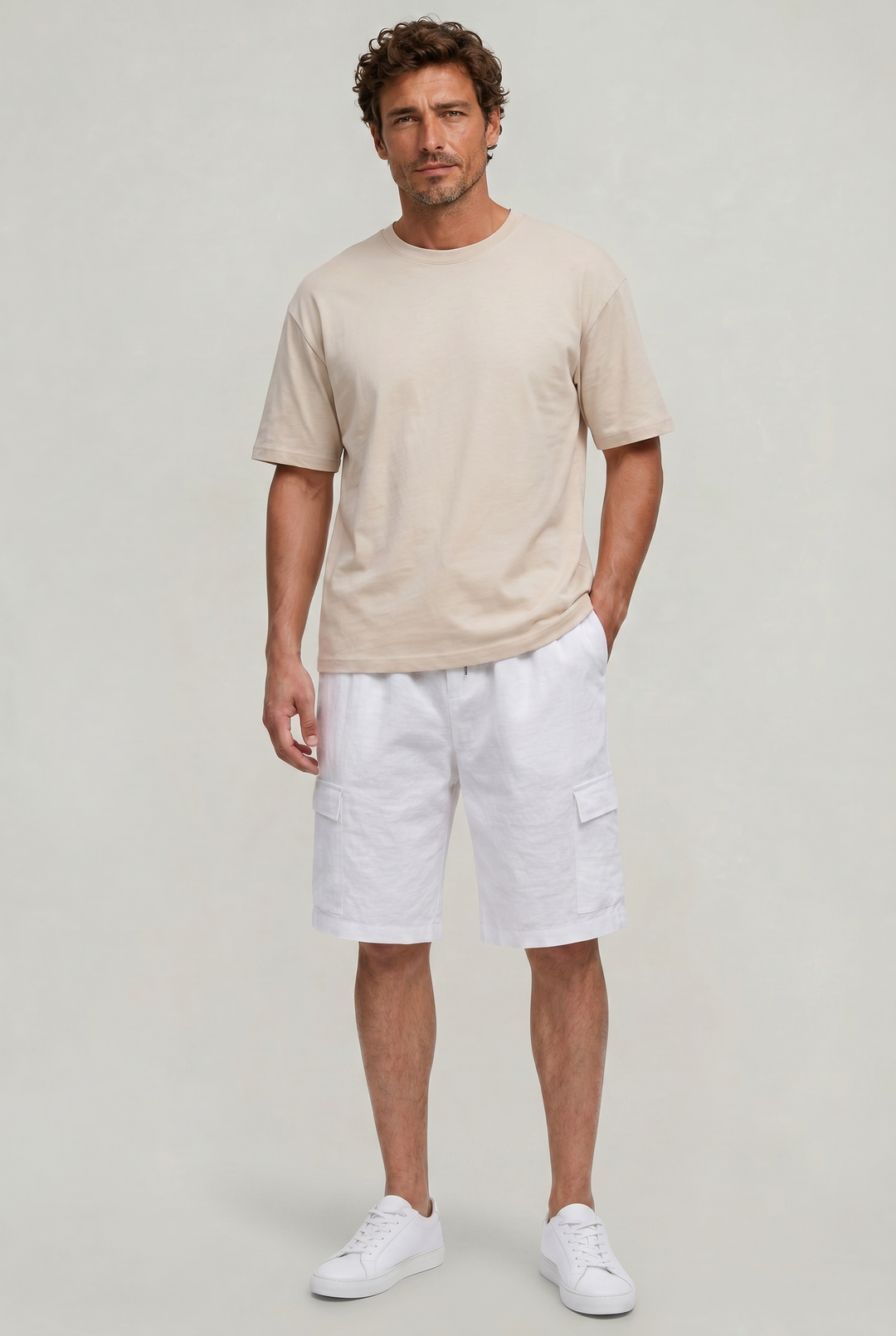 Casual men's cargo shorts, knee-length, with drawstring waist. Essential summer fashion for warm weather comfort.