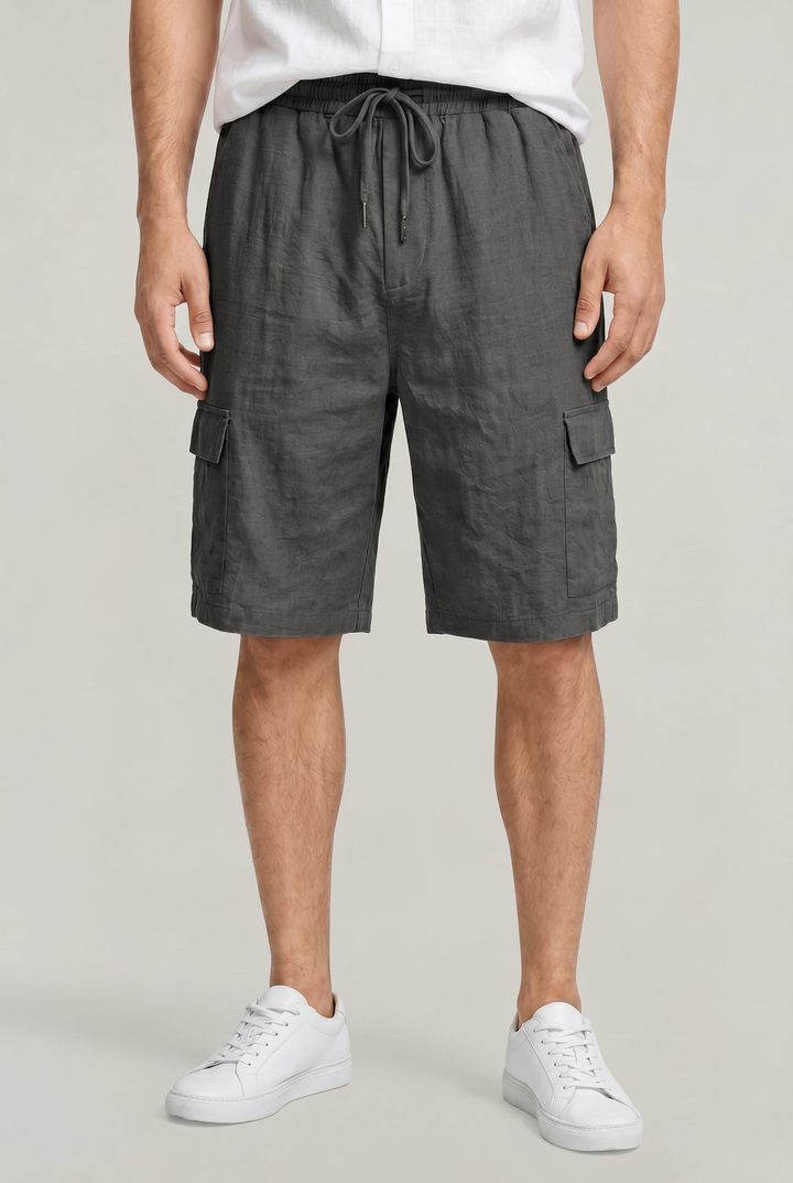 Stylish men's knee-length cargo shorts. Polished fabric, drawstring waist, and spacious utility pockets for summer.