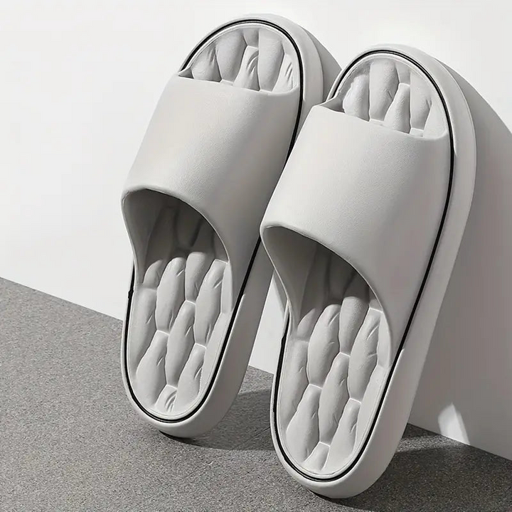 Comfortable men's slides with cushioned footbed & massage tech. Perfect casual footwear for beach, pool, athletic recovery.