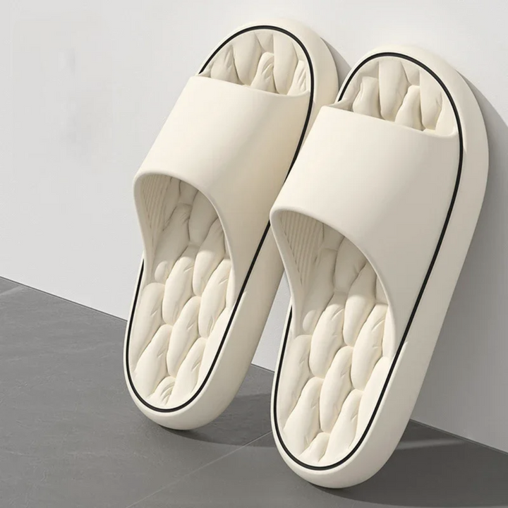 Stylish men's graceful slides featuring a cushioned design and soothing massage footbed. Great for everyday casual wear.
