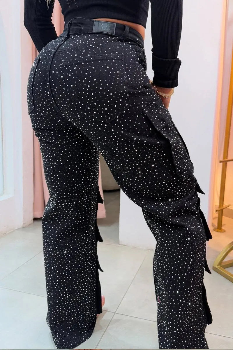 Full shot of women's fashionable sparkling rhinestone cargo pants, a statement piece.