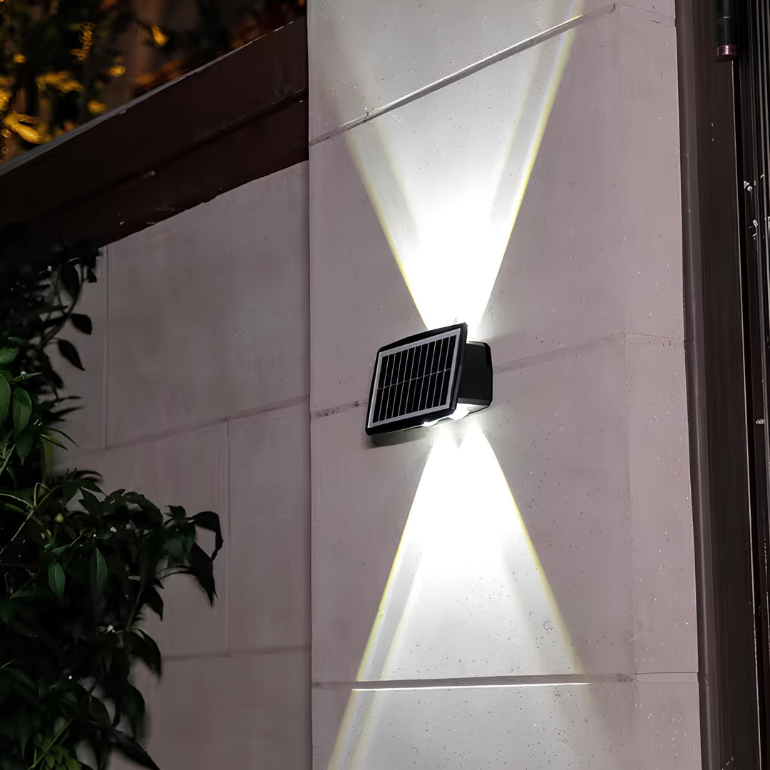 Decorative solar wall light with dual warm/white LED options, ideal for garden, patio, and pathway illumination.