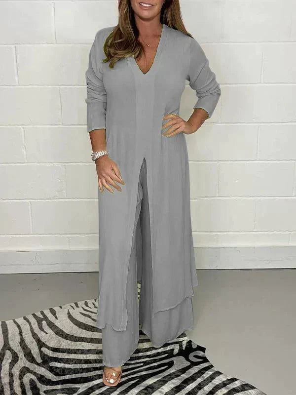 Women's stylish & comfortable two-piece casual suit set. Includes a matching relaxed blouse & wide-leg pants.