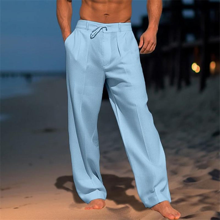 Modern men's white wide leg trousers, offering a comfortable, relaxed fit ideal for contemporary casual fashion.