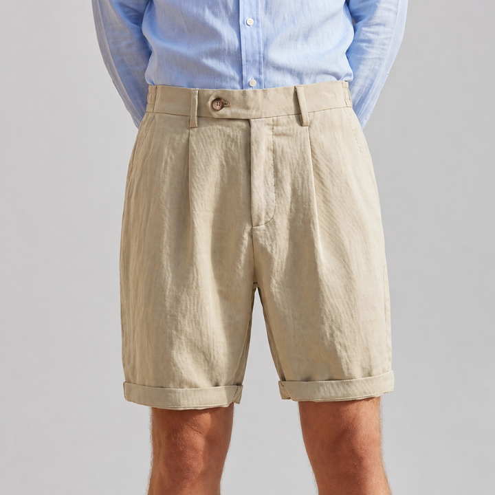 Men's classic linen pleated shorts with turn-up cuff. Ideal for smart casual summer fashion & warm weather.