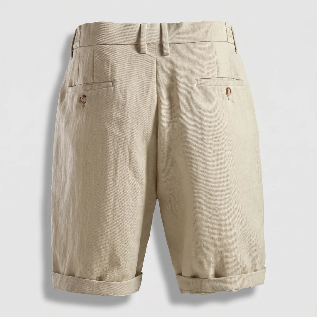 Stylish men's classic linen pleated shorts with turn-up cuff. Perfect for summer, smart casual & warm weather outfits.
