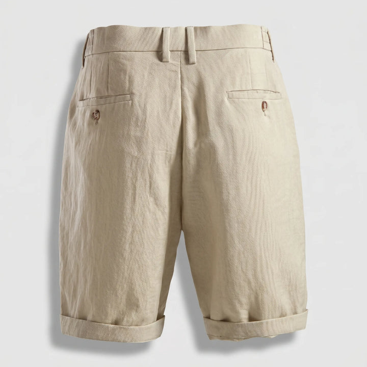 Stylish men's classic linen pleated shorts with turn-up cuff. Perfect for summer, smart casual & warm weather outfits.