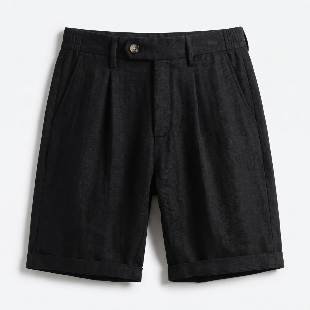 Front view: Men's classic linen pleated shorts featuring a sophisticated turn-up cuff. Essential men's summer shorts.