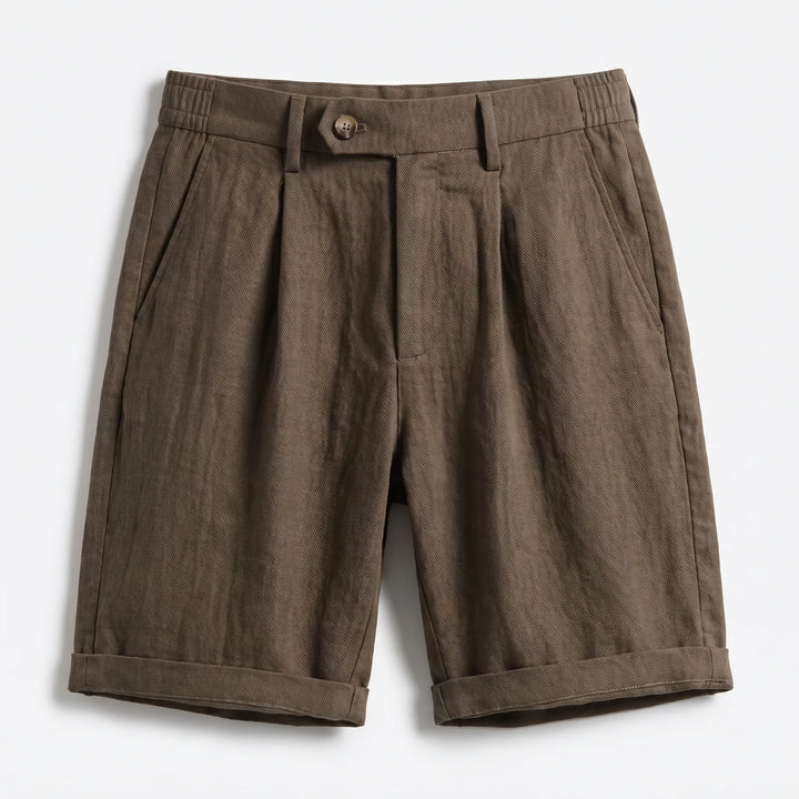 Men's fashion: Classic linen pleated shorts with turn-up cuff. Smart casual men's shorts for warm weather & comfort.