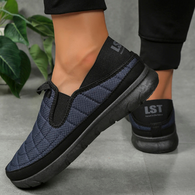 Men's orthopedic slip-on shoes, comfortable & cozy with a cushioned sole for support.