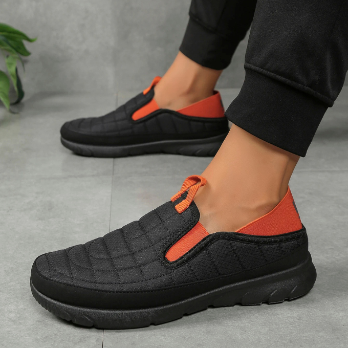 Quilted men's slip-on orthopedic shoes, offering cozy cushioned comfort & foot support.
