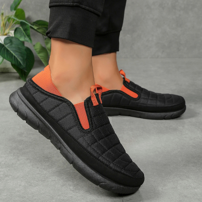 Cozy men's orthopedic slip-on shoes, quilted design, cushioned sole, ideal for daily wear.