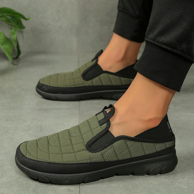 Quilted design men's orthopedic slip-on shoes, providing cozy cushioned comfort & foot support.