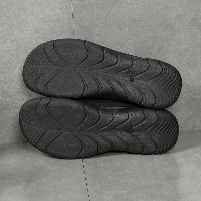Men's cozy orthopedic slip-on shoes with quilted design, cushioned for foot support.
