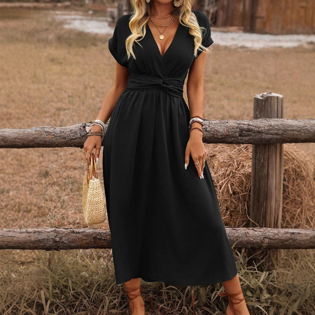Chic women's boho maxi dress with V-neck, elegant and versatile for casual or special occasions.