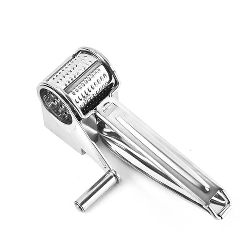 Kitchen cooking accessory: Manual rotary grater with versatile drums for efficient cheese & veggie prep.