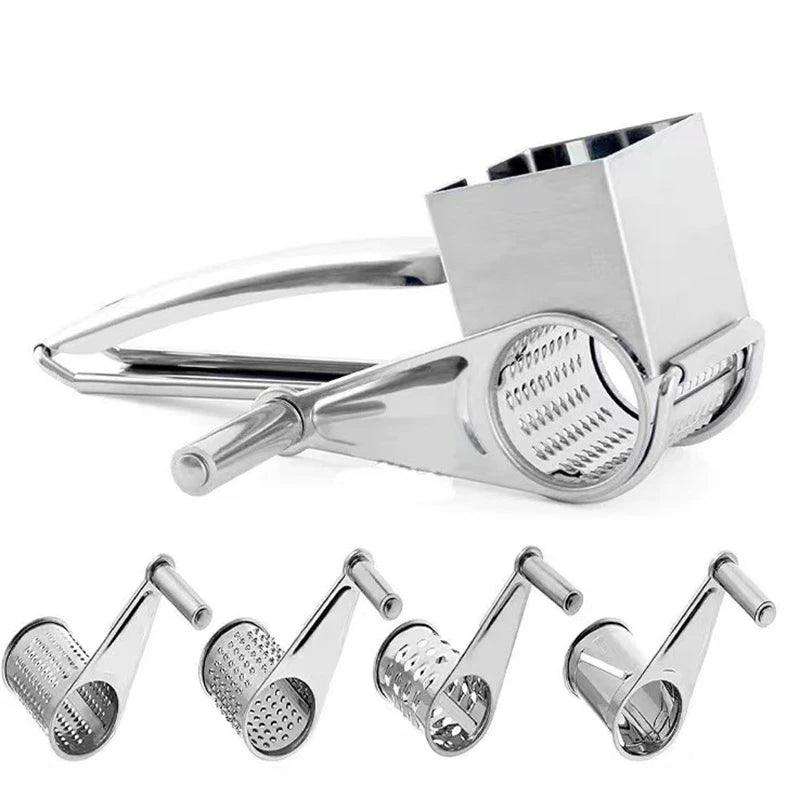 Kitchen manual rotary grater with interchangeable drums for slicing & shredding cheese/veggies.
