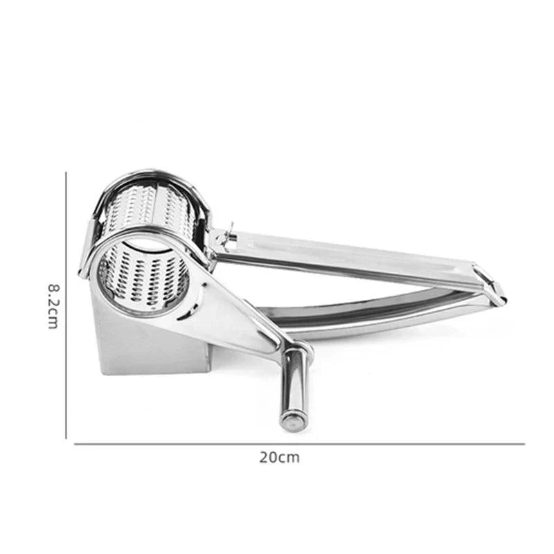 Compact manual rotary kitchen grater with versatile drums for efficient food prep & storage.
