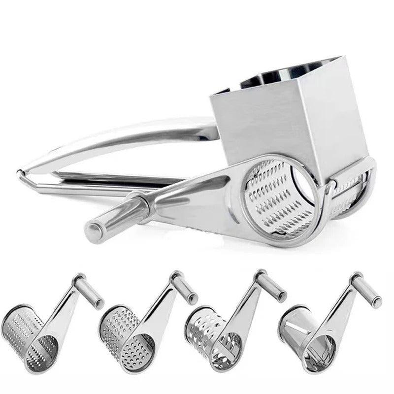 Close-up: Stainless steel manual rotary cheese grater with versatile drums & ergonomic handle.