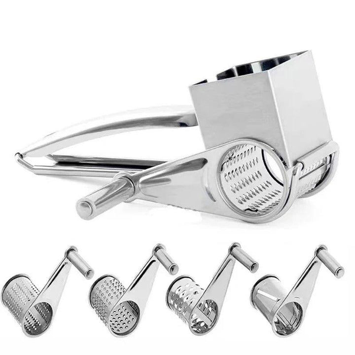Close-up: Stainless steel manual rotary cheese grater with versatile drums & ergonomic handle.