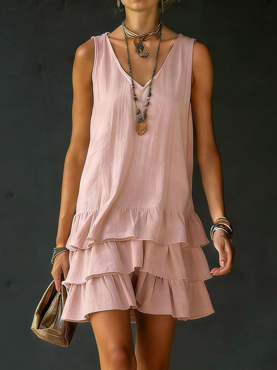 Effortless women's V-neck sleeveless tunic dress with a stylish ruffle hem. Perfect casual summer everyday wear.