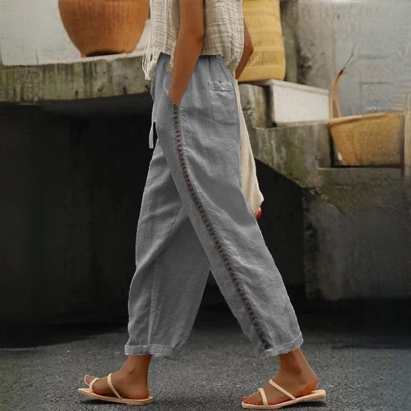 Comfortable women's linen blend cropped pants with elastic waist, ideal for travel or chic everyday summer fashion.