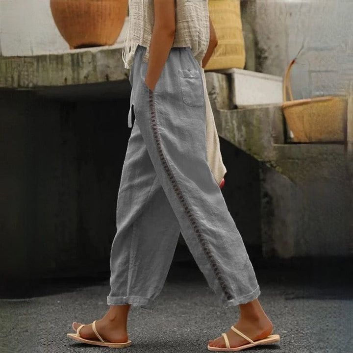 Comfortable women's linen blend cropped pants with elastic waist, ideal for travel or chic everyday summer fashion.