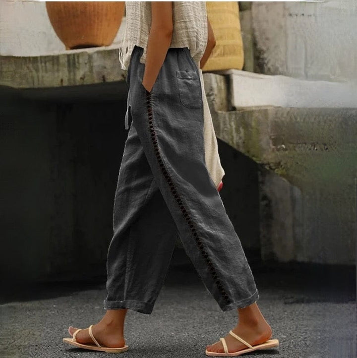 Versatile women's linen cropped pants with elastic waist and eyelet trim, great for casual or dressed-up summer looks.