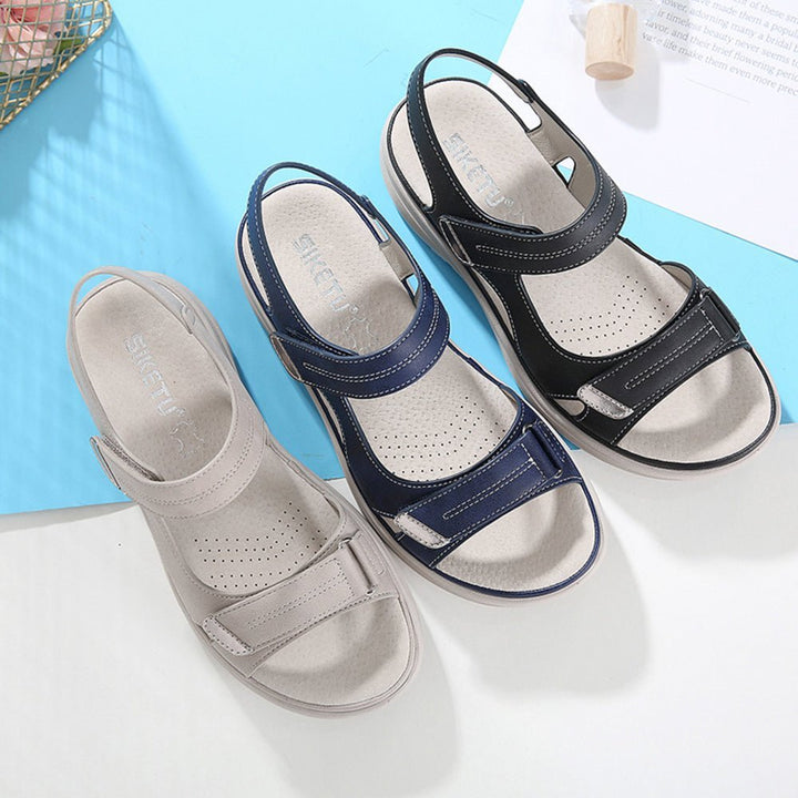 Casual women's summer sandals, orthopedic arch support, polished look, perfect for warm weather comfort.