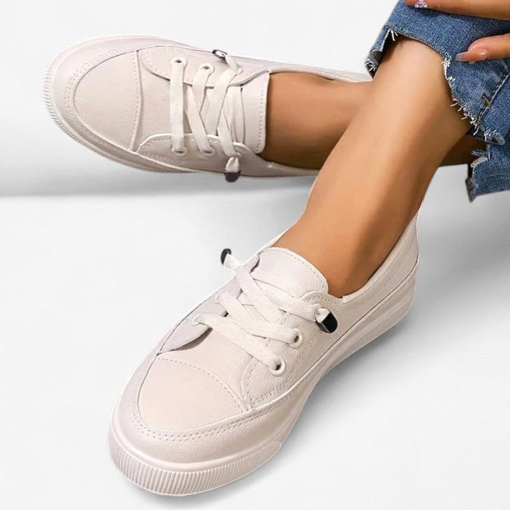 Supportive women's walking shoes featuring cushioned comfort, ideal for long walks & daily activities.