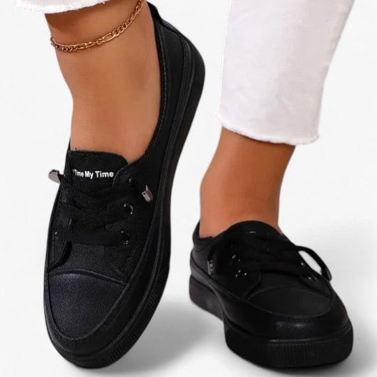 Durable sole of women's orthopedic walking shoes, providing stable support & flexible comfort.