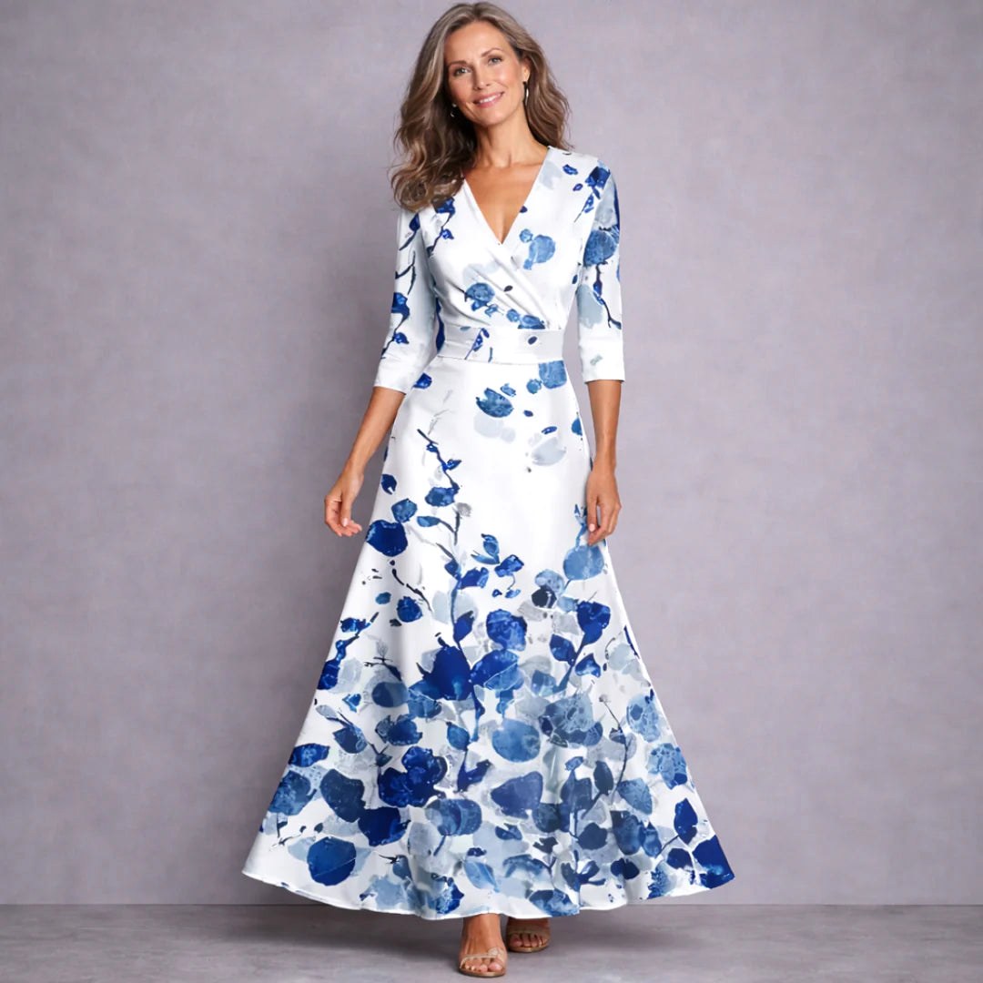 Women's mid-sleeve flowing floral maxi dress, perfect for elegant casual wear. Comfortable spring & summer style.