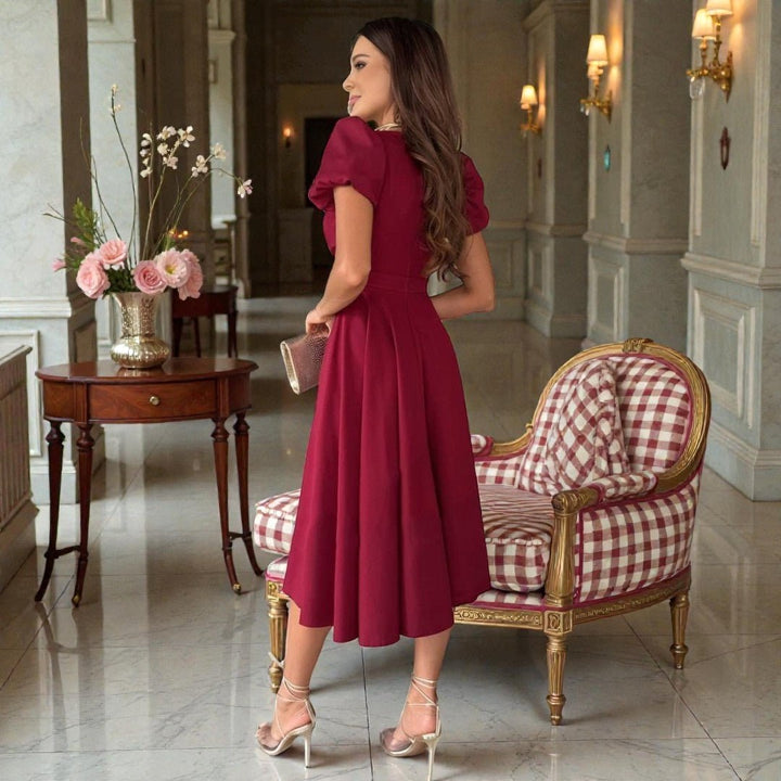 Classic Women's Midi Dress, elegant V-neck and fashionable puffed sleeves, ideal for any occasion.
