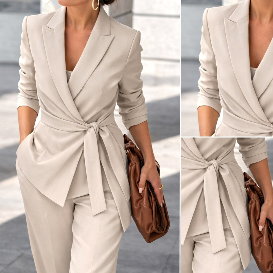 Fashionable women's two-piece set with a belted waist and trendy wide-leg trousers. Elegant ladies' suit.