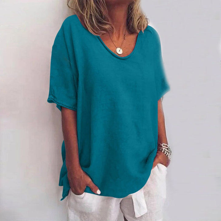 Comfortable women's loose summer top, breathable casual blouse, perfect for relaxed everyday wear and style.