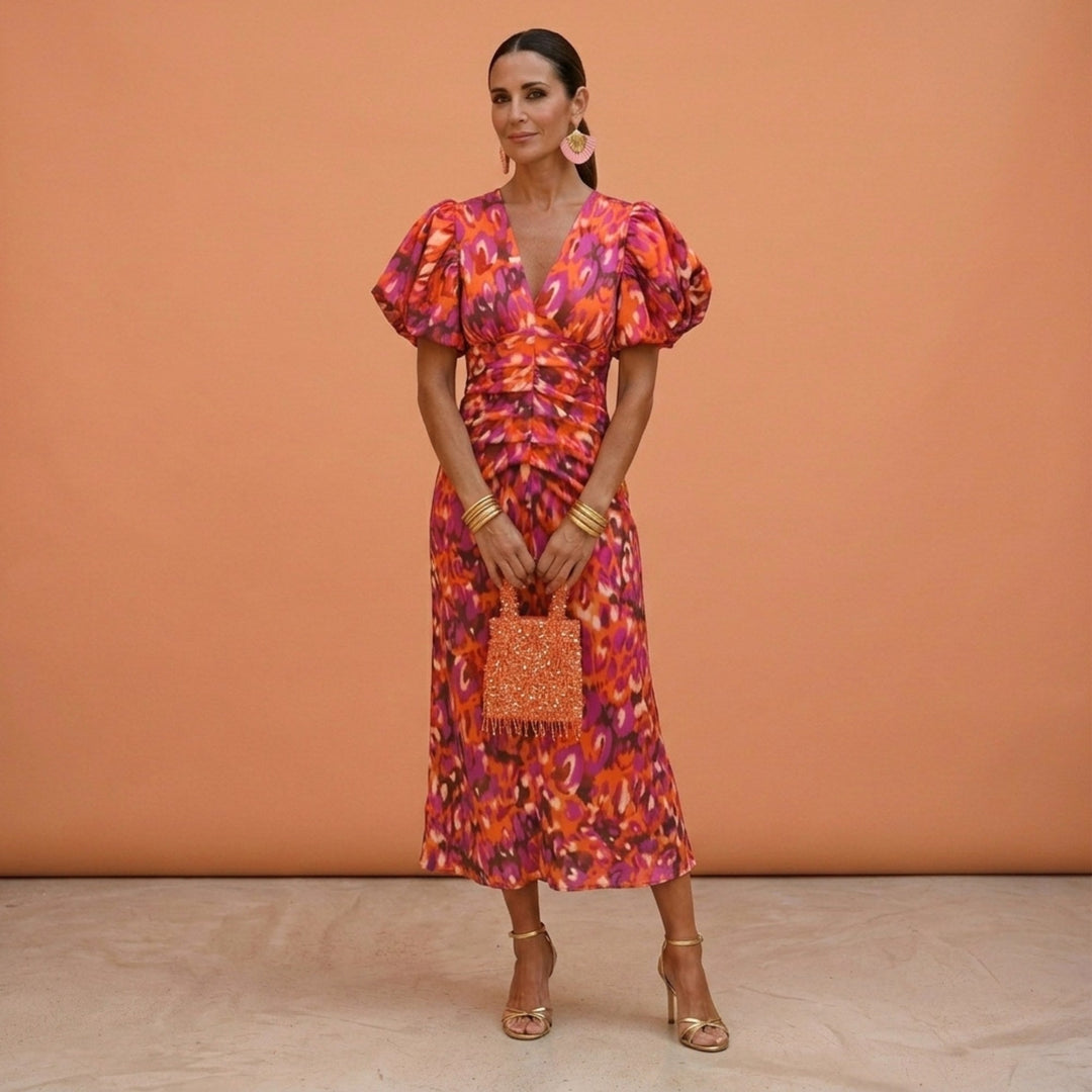 Women's elegant V-neck day dress with puffed sleeves, perfect for a chic, comfortable look.