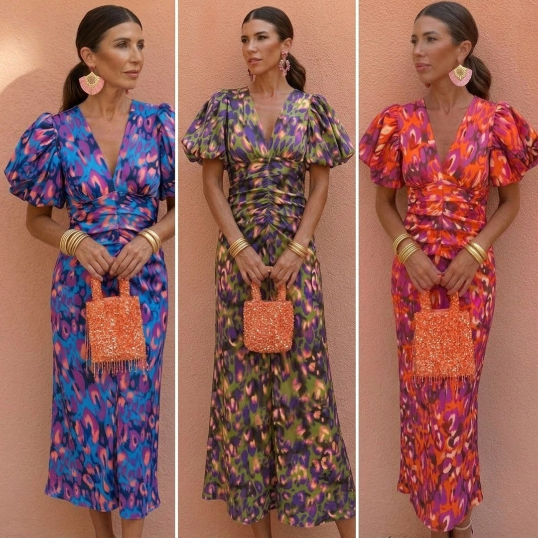 Graceful women's V-neck dress with puffed sleeves, ideal for both casual and semi-formal occasions.