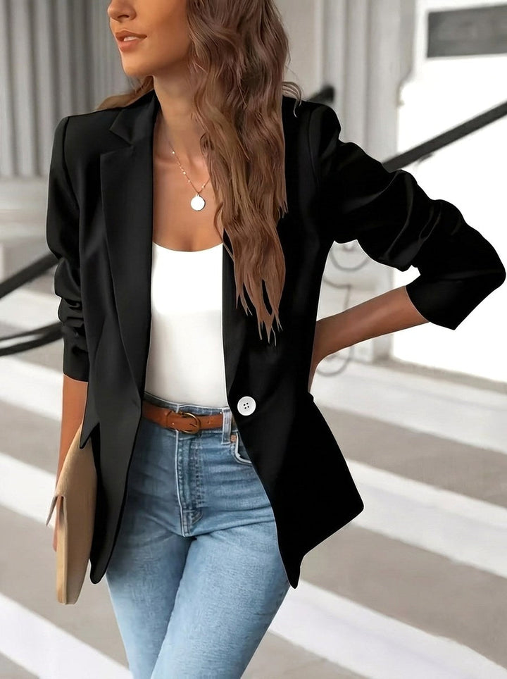 Women's professional tailored blazer with notched lapel & single-button closure. Ideal for office, business, and workwear.