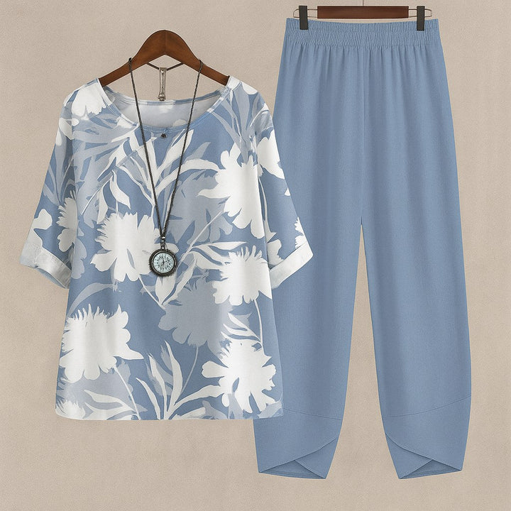 Stylish women's floral top, part of a comfy two-piece lounge set, ideal for relaxed casual wear.